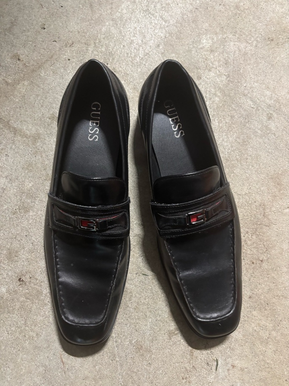 GUESS Black Leather Men’s Slip-On Loafers with Metal Logo Accent